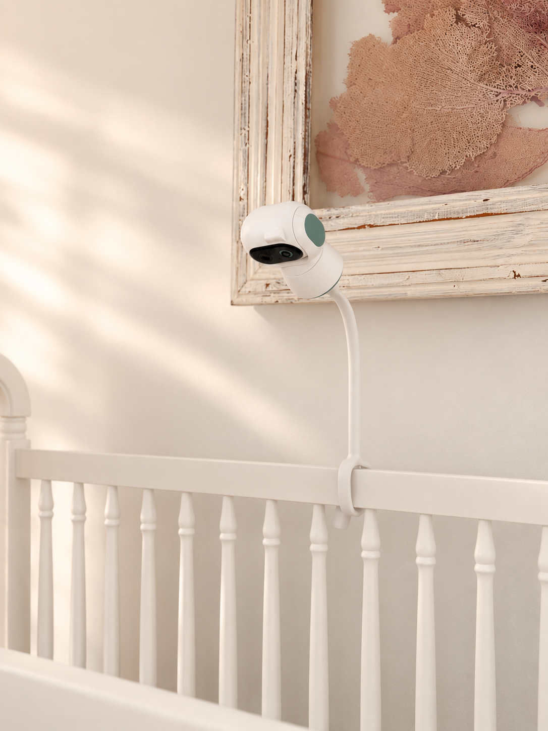 SightAware camera unit mounted on crib arm